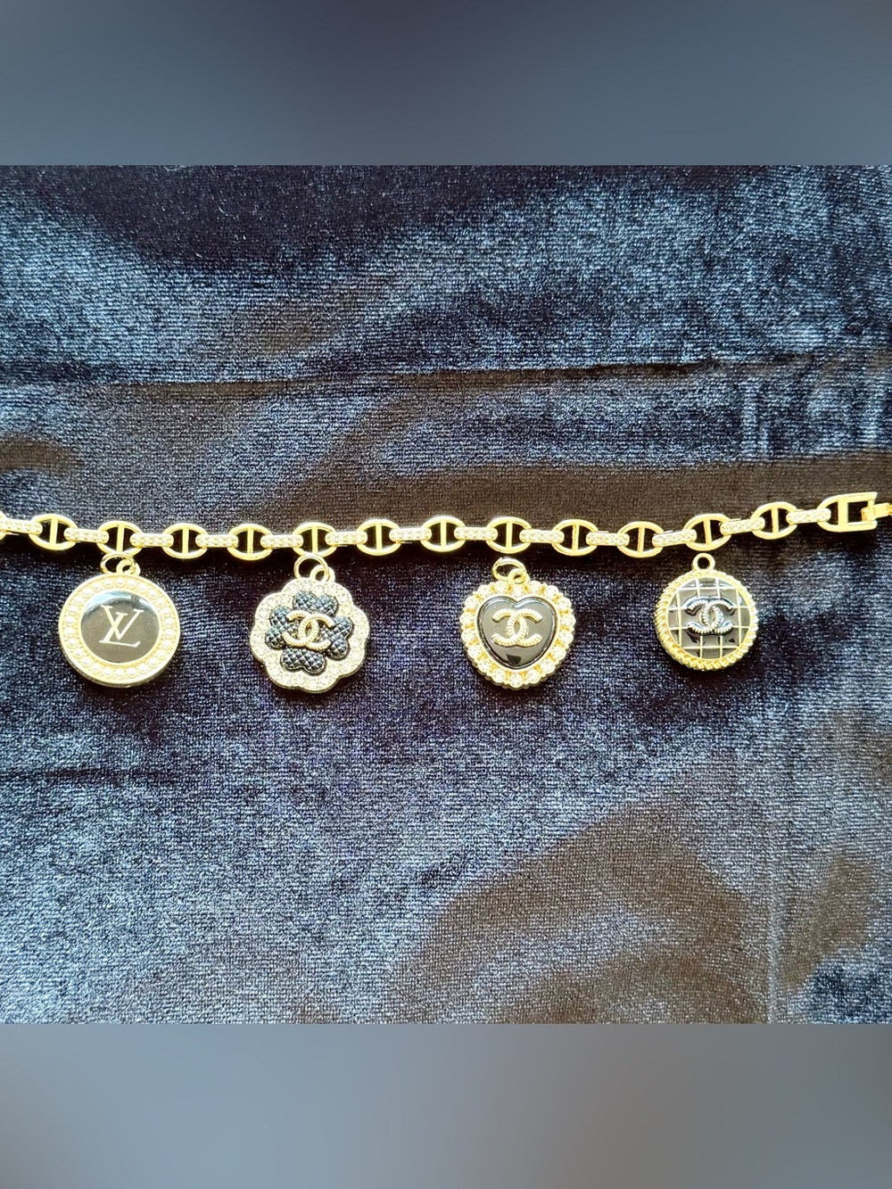 Gold-Tone Pig ๐ฝ Nose Link Bracelet with Black CHANEL Camellia Charm - Picture 7 of 9